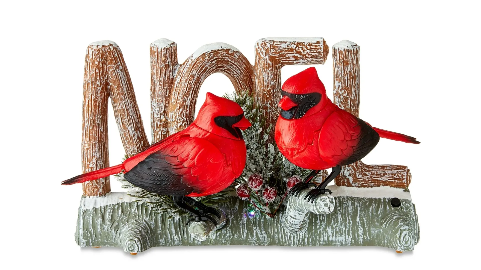 A Christmas decoration featuring two male cardinals in front of the word "Noel"
