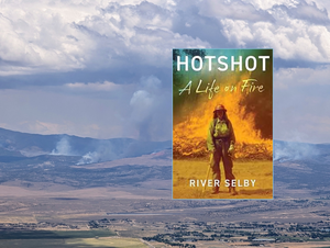 The book cover of Hotshot: A Life on Fire by River Selby, showing a person in a hard hat holding a axe-like tool in front of a burning fire.